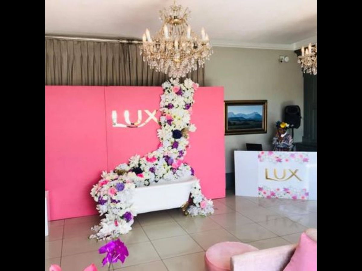 Custom floral activation wall for Lux beauty event in South Africa