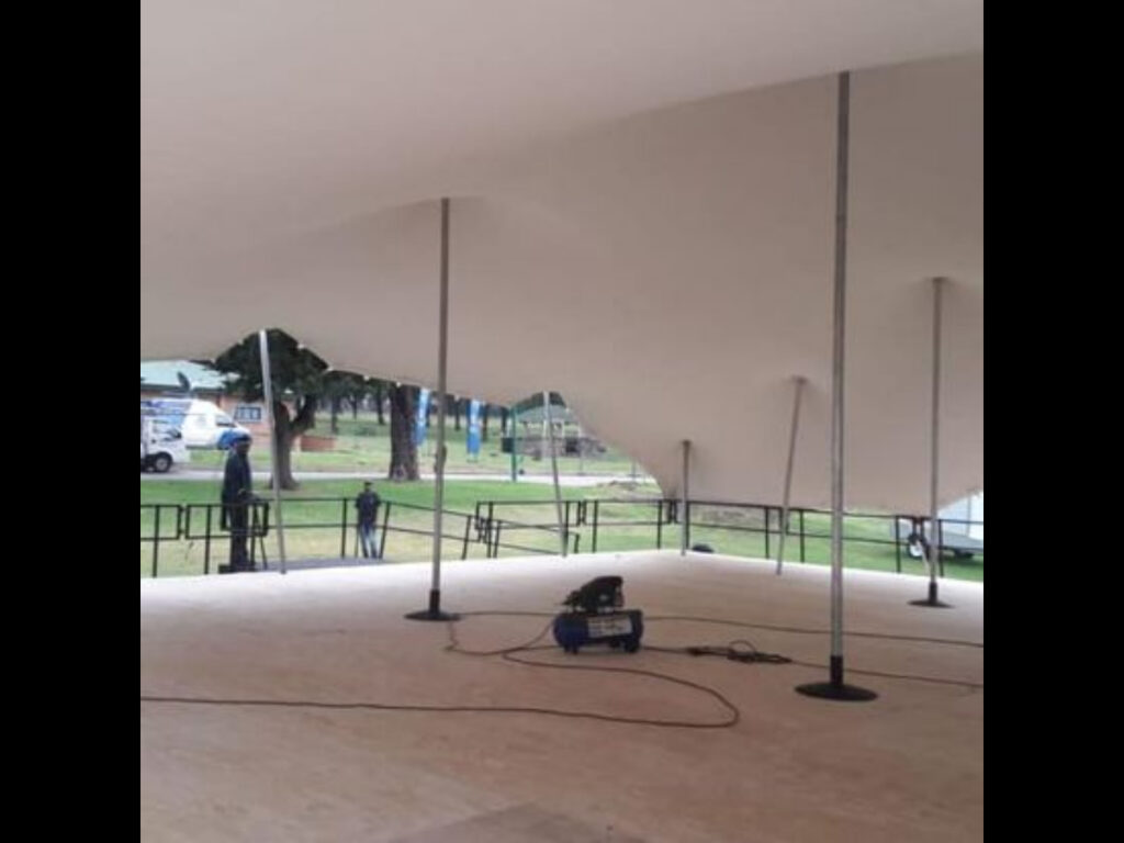 Large white stretch tent setup for outdoor events in Cape Town