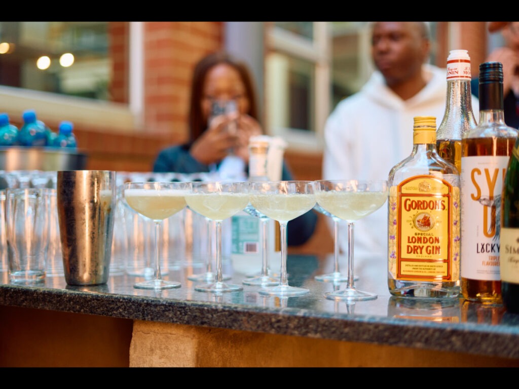 Outdoor gin and cocktail bar with curated drinks and decor
