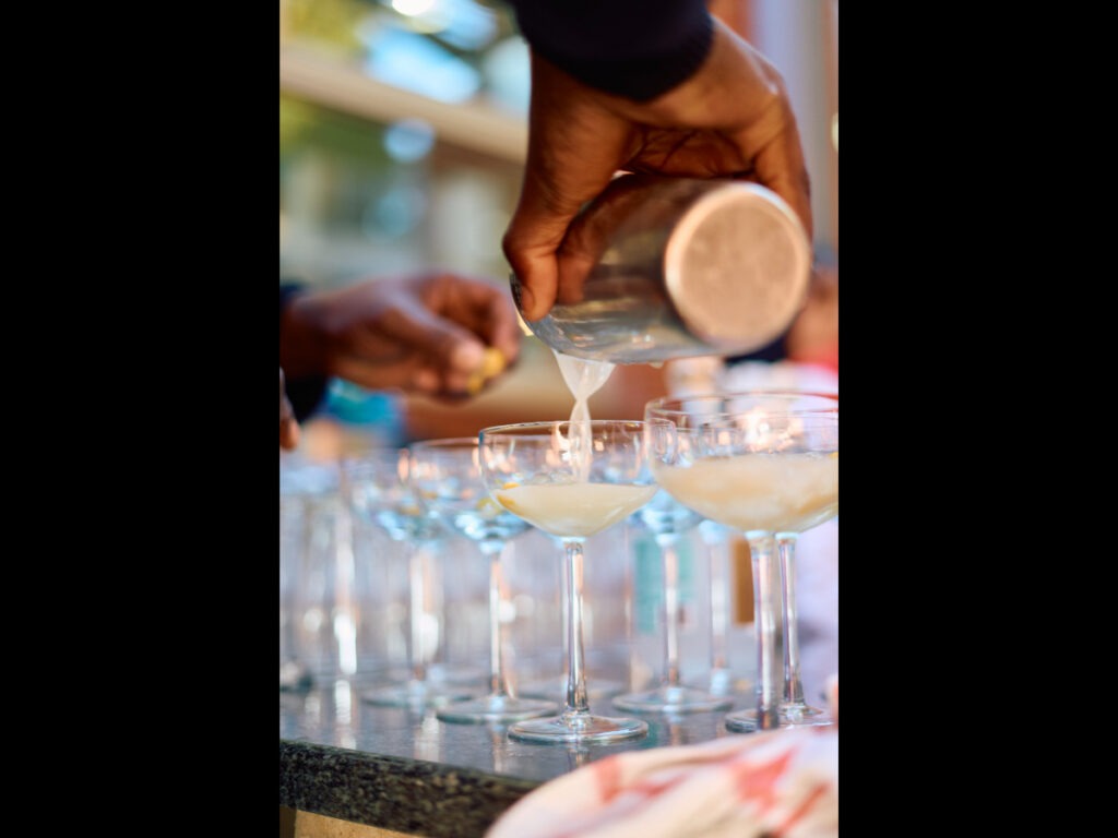 Bartender pouring cocktails at stylish Cape Town event