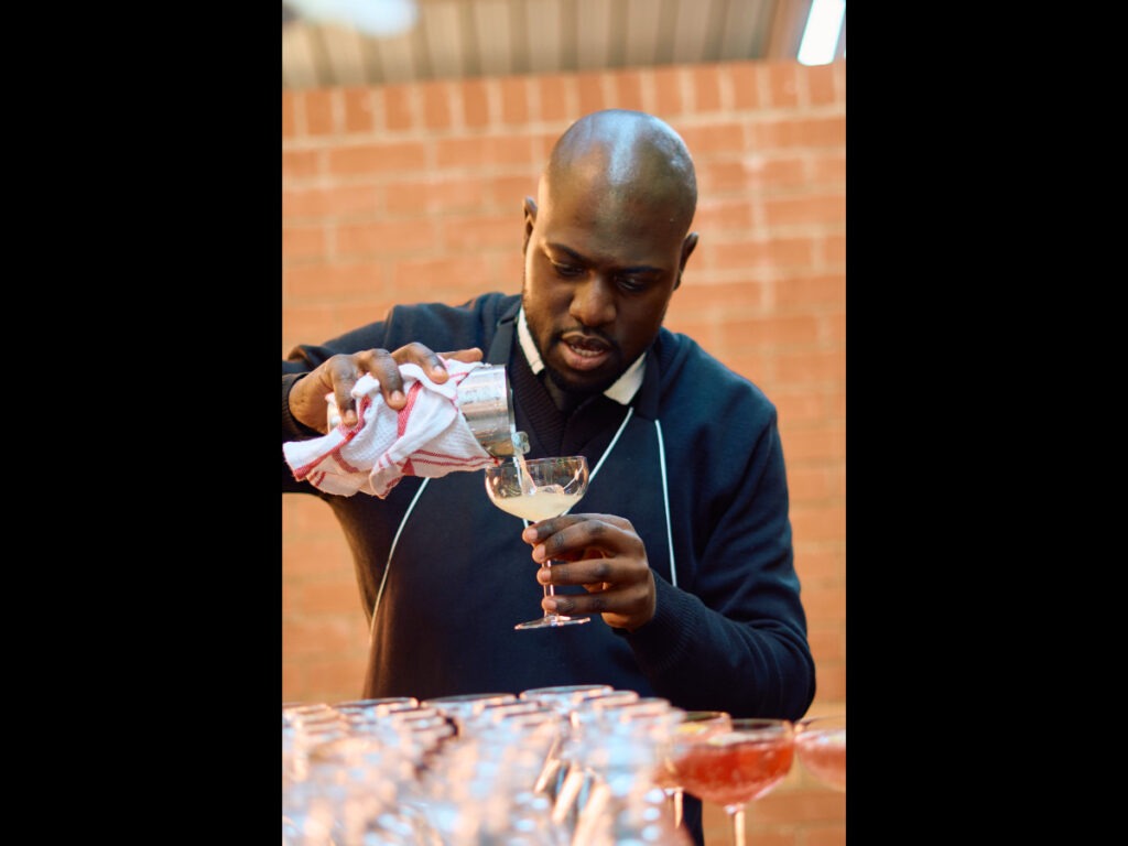 Bartender pouring drinks at Cape Town event