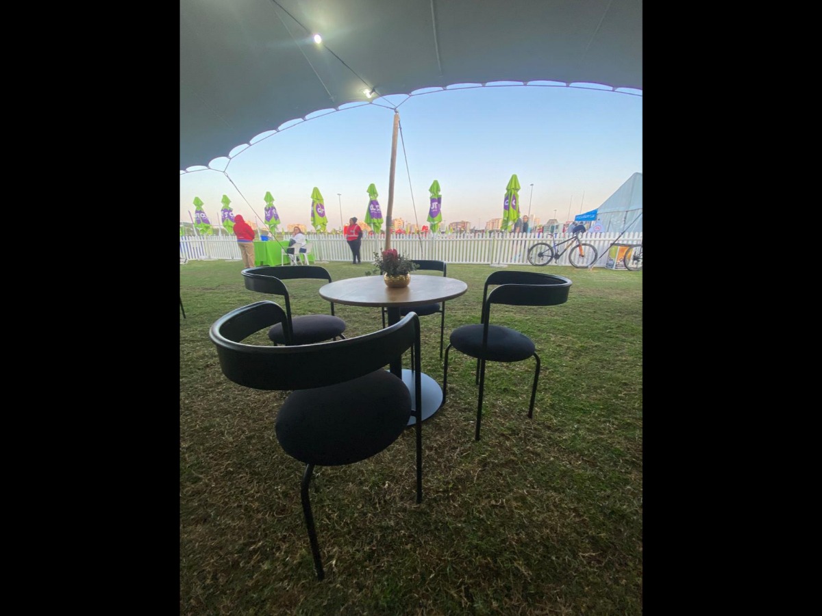 Designer black chair and round table setup for Cape Town event