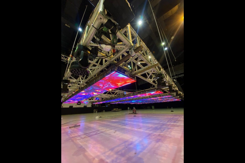 Suspended triangle LED wall from ceiling