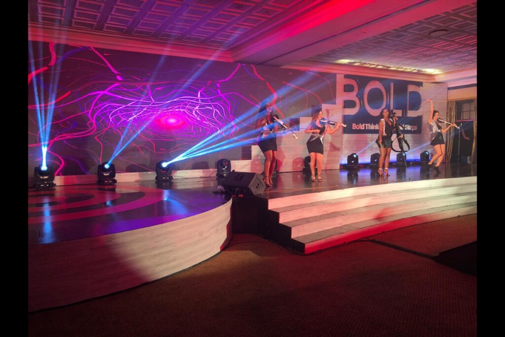 Corporate event stage with curved LED setup