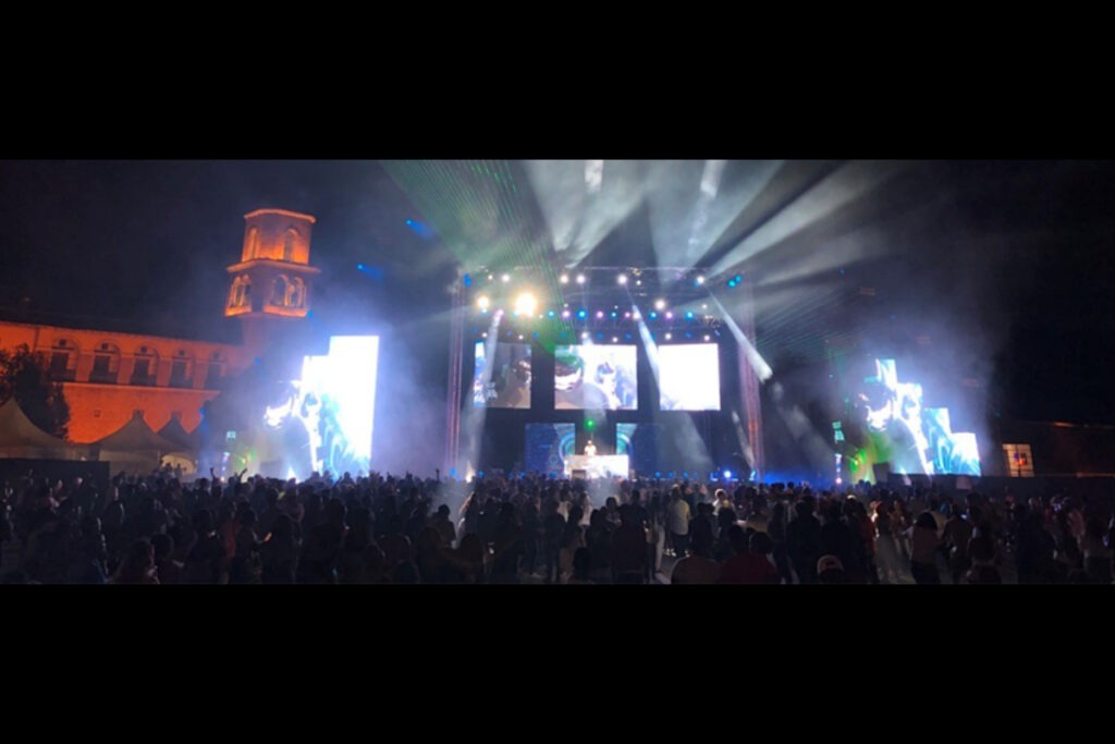 Event Management Cape Town Services. Large outdoor stage with LED screens and lighting at Cape Town event