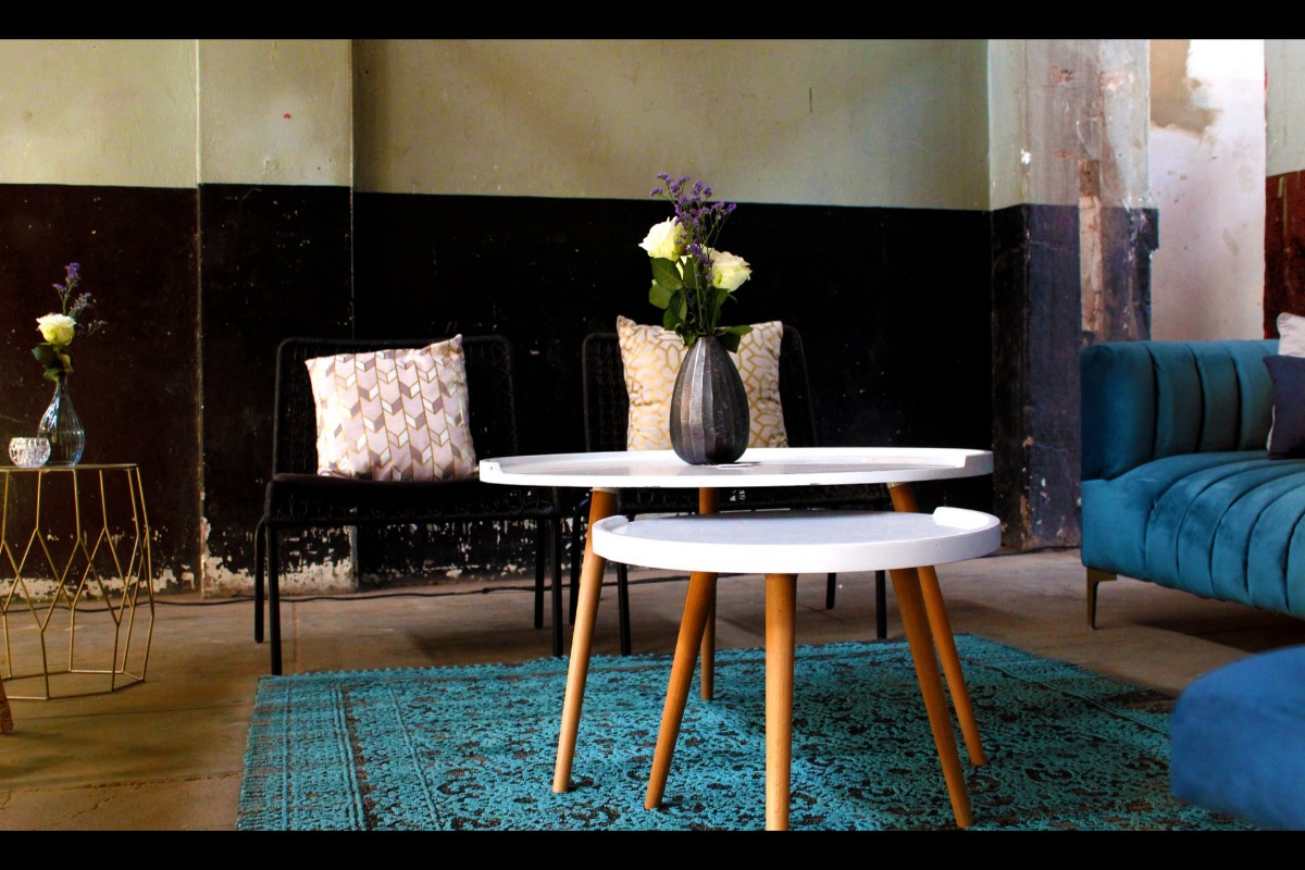 Mid-century style event furniture with teal velvet sofa – Cape Town lounge hire