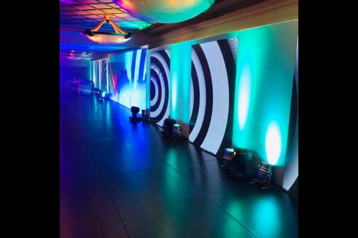 Corporate event with custom LED screens and branded playback content by Animate-Co