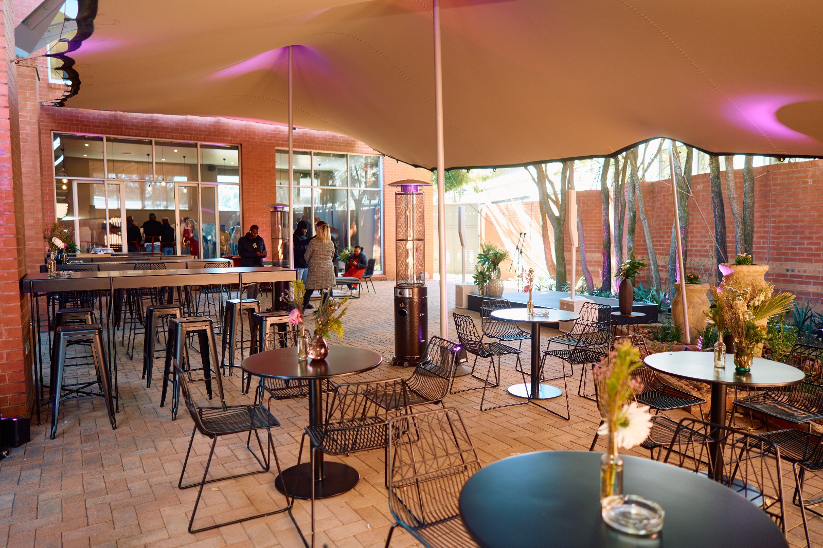 Outdoor black cocktail tables and chairs for events – Cape Town furniture hire