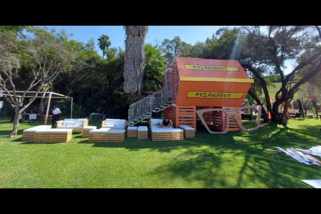 Branded outdoor wooden expo house with lawn setup