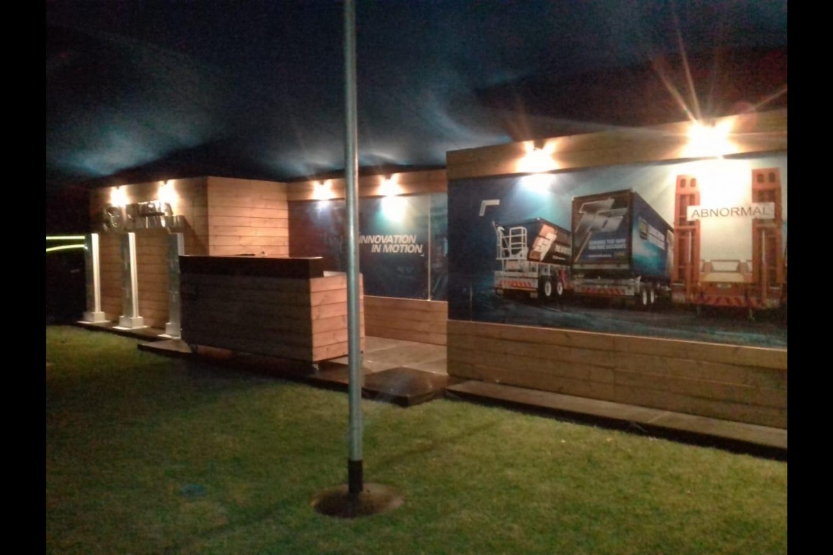 Outdoor modular exhibition stand with branded panels