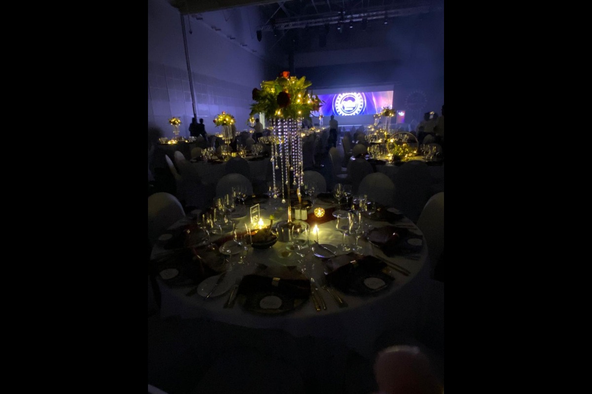 Elegant black and gold gala table setup