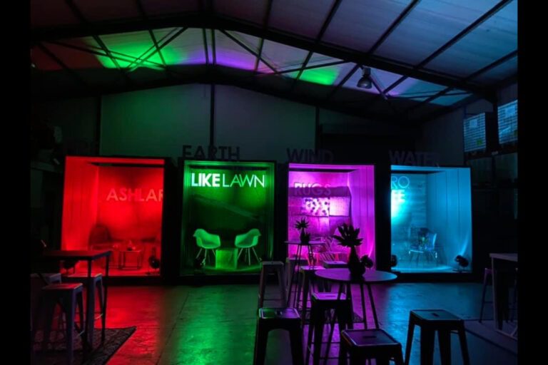 colour lit exhibition activation booth with branded display zones Cape Town